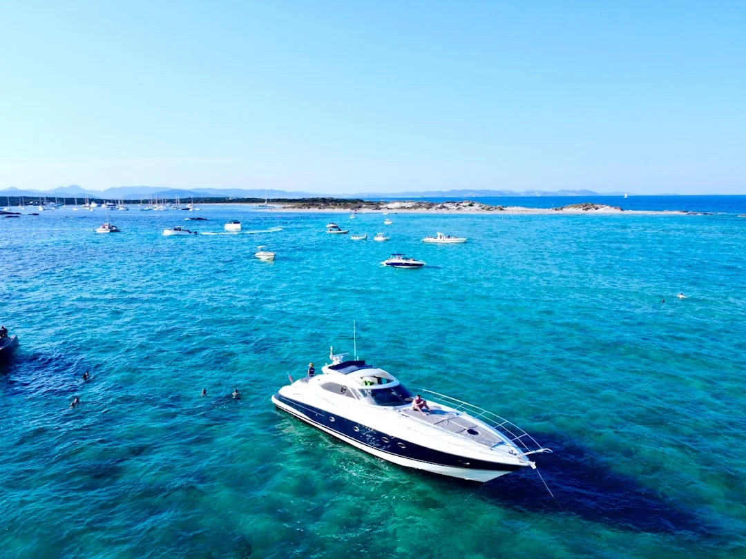 Bareboat charter yacht at anchor in a remote cove
