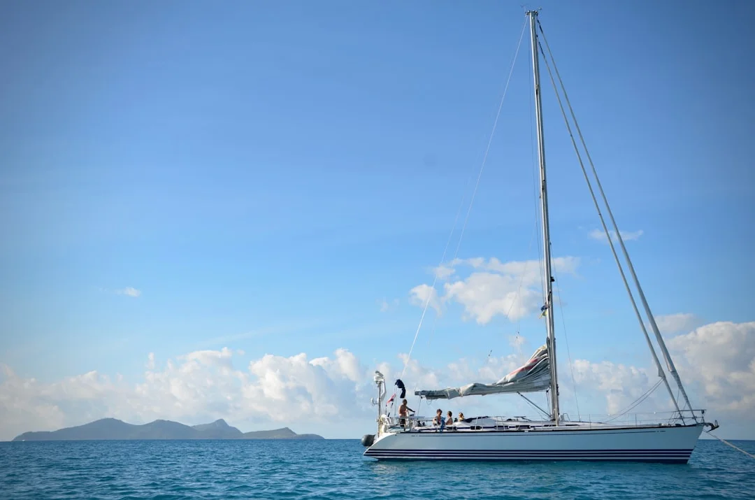 Family enjoying a bareboat charter at anchor in turquoise waters