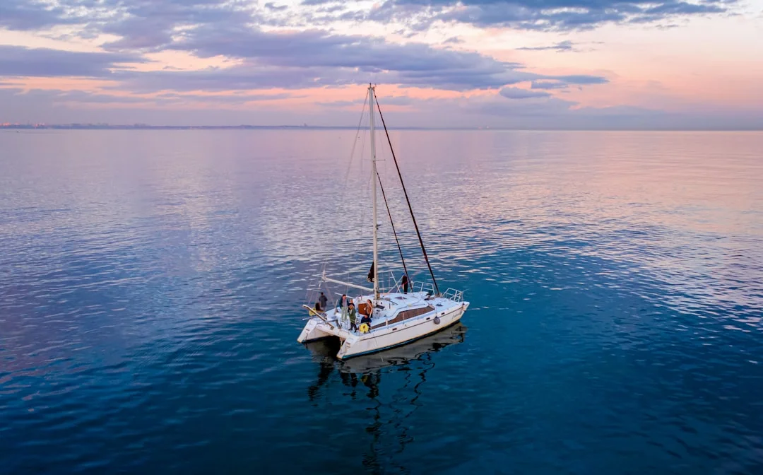 Sailing yacht alone on the mid-Atlantic ocean during offshore passage