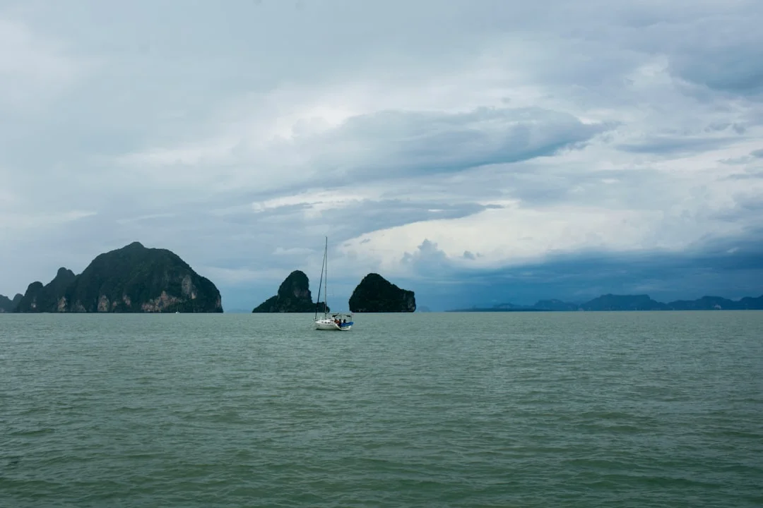 Limestone karst islands rising from the Andaman Sea