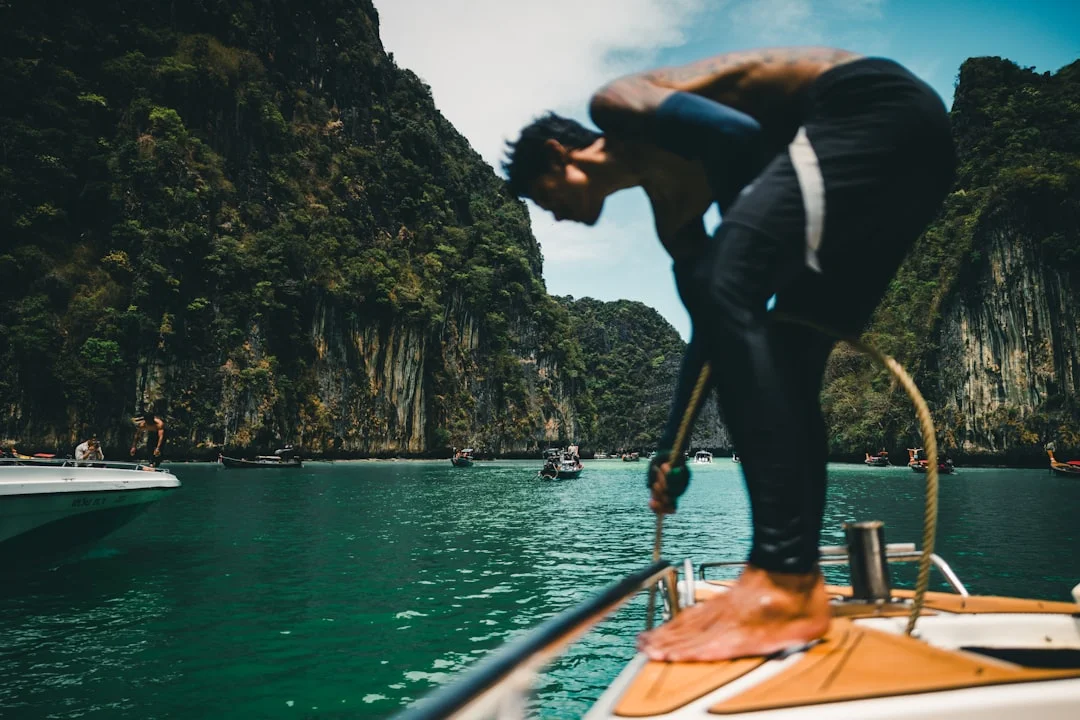 Sailing boat anchored in a sheltered bay near Phuket Thailand