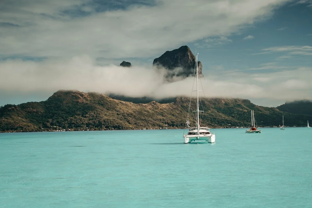 Chart-style overview map showing Tahiti/Moorea, Huahine, Raiatea/Tahaa, Bora Bora with nm legs