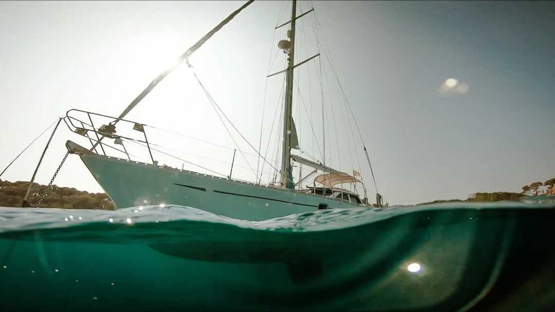 Sailboat at sunset preparing for a long ocean passage