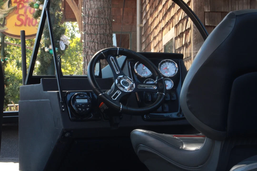 Sailboat cockpit showing helm and instruments