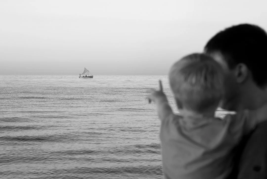 Family enjoying a day of sailing together on a yacht
