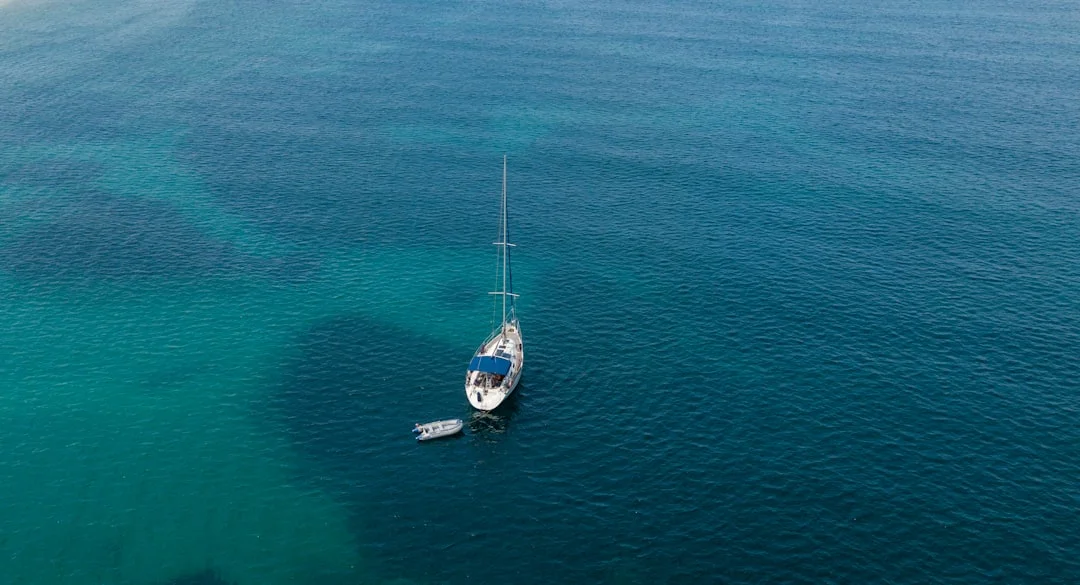 Dodecanese marina scene (Kos or Rhodes) with meltemi flags streaming
