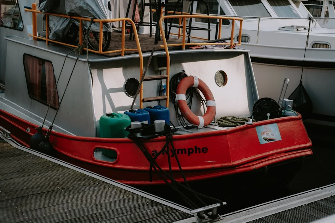 A compact diesel forced-air heater installed under a berth with labeled ducting and exhaust routing