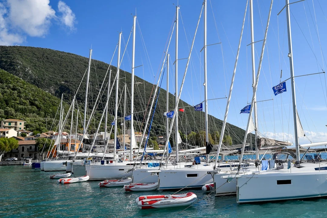 Stern-to docking in Croatia with neighboring boats and a quay