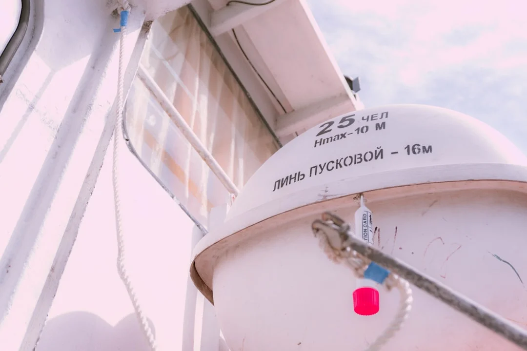 Multimeter probes measuring voltage at an electric macerator motor during a flush cycle