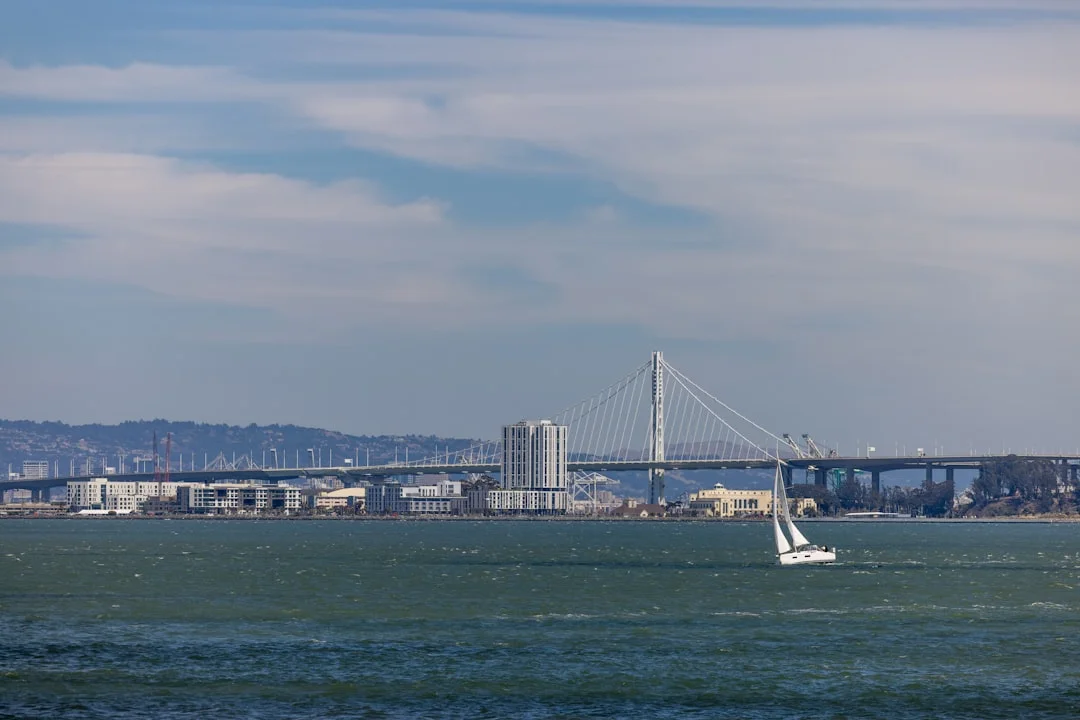 Container ship in the SF shipping lane with sailboats crossing well ahead at right angles
