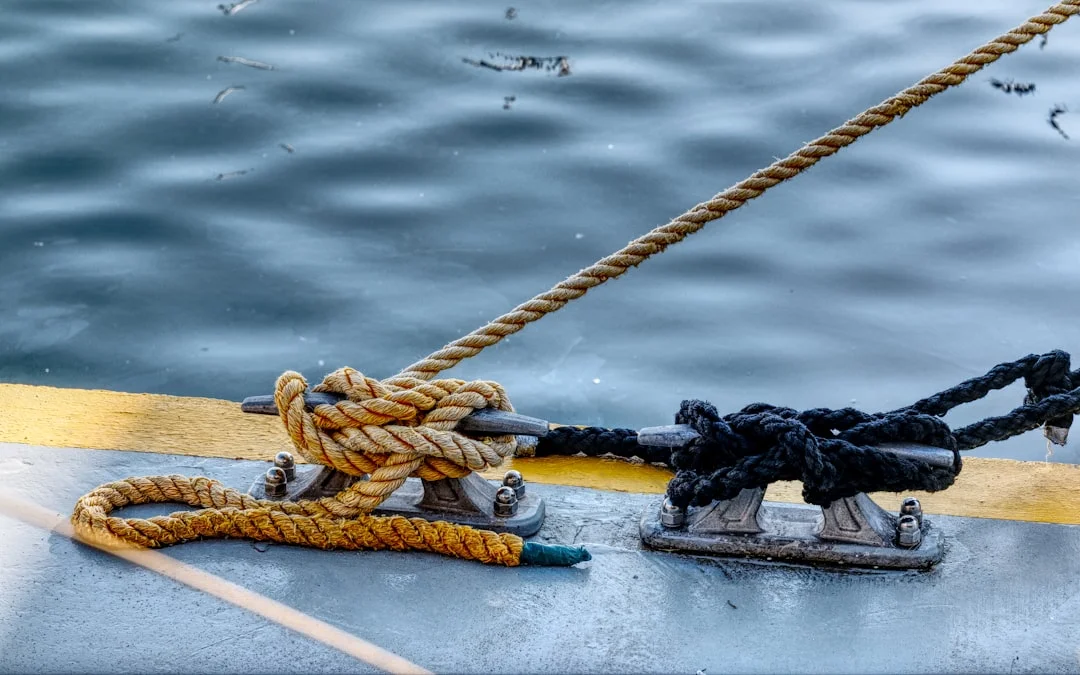 mooring kit laid out—stern lines, chafe sleeves, snubbers, shackles