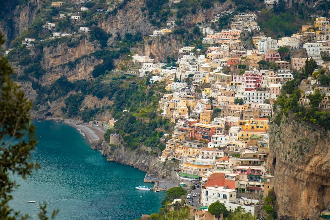 Sunrise approach toward Amalfi with yachts on mooring buoys