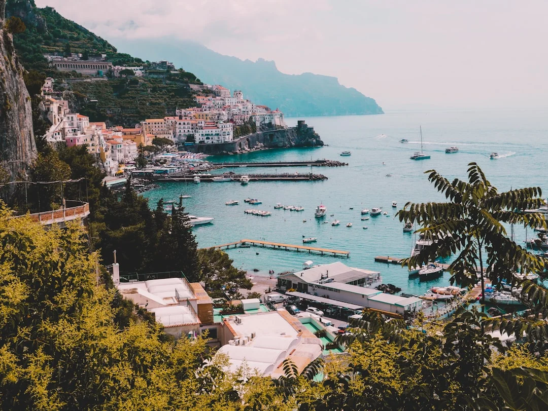Chart-style overview of Naples–Capri–Positano–Amalfi–Salerno with NM leg labels