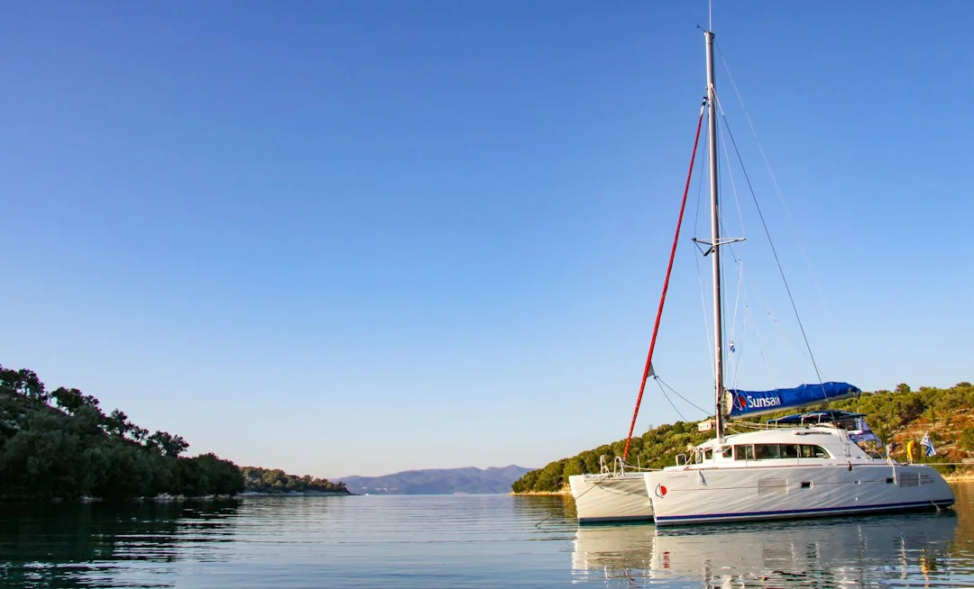 Sunset view of a well-spaced anchorage with boats swinging freely